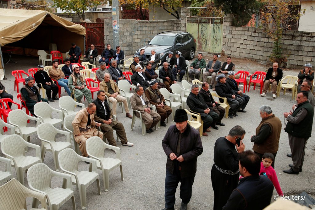 People gather to offer condolences to the family of Maryam Nuri, who died trying to cross the channel between France and Britain, in Erbil, Iraq, on November 28, 2021 | Photo: Reuters