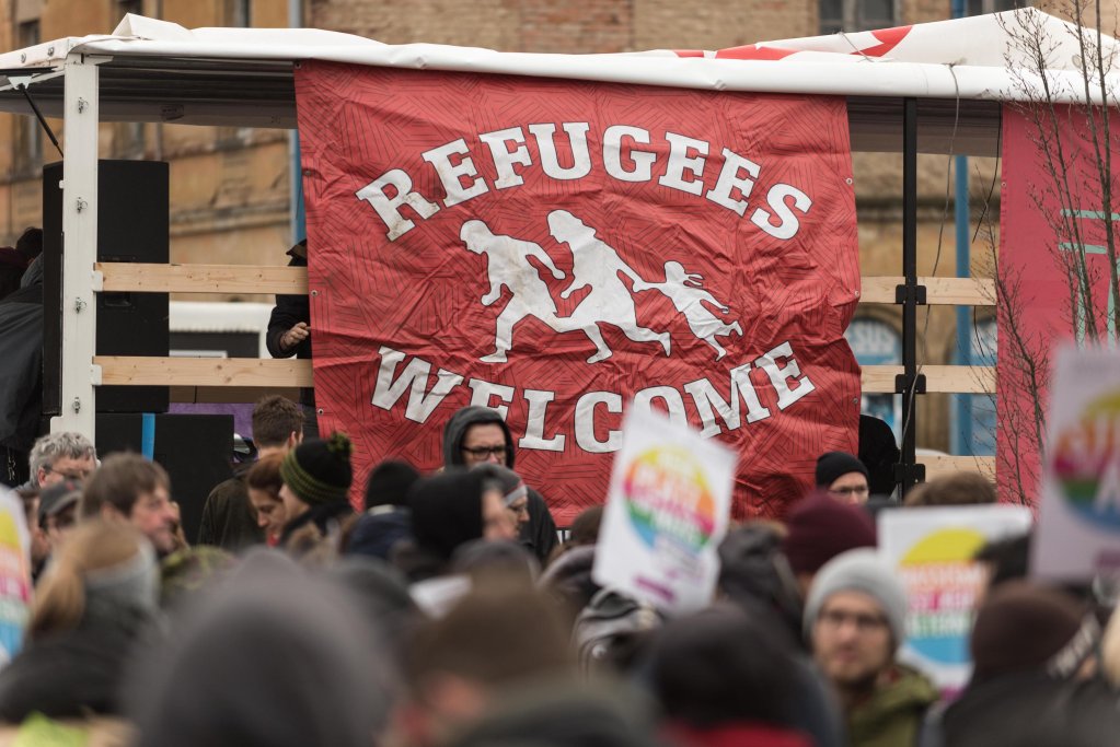 A banner reading 'Refugees Welcome' at a demonstration against the convention of the German right-wing 'Alternative for Germany' party (AfD), Riesa, Germany, 12 January 2019. | Photo: EPA/MARKUS HEINE