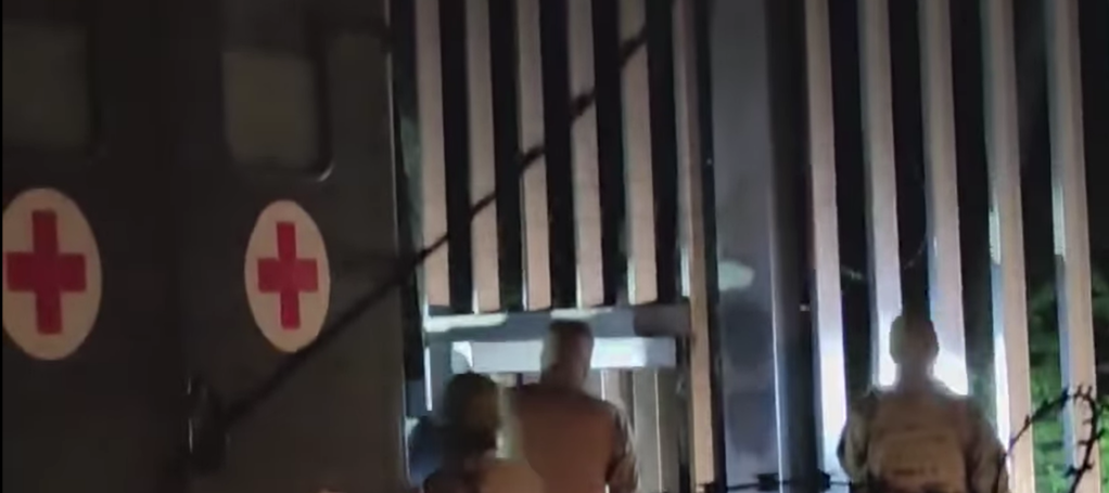 A screenshot from the POPH video shows what looks like a military ambulance attending the migrants who were apparently taken ill at the border | Source: POPH Facebook video