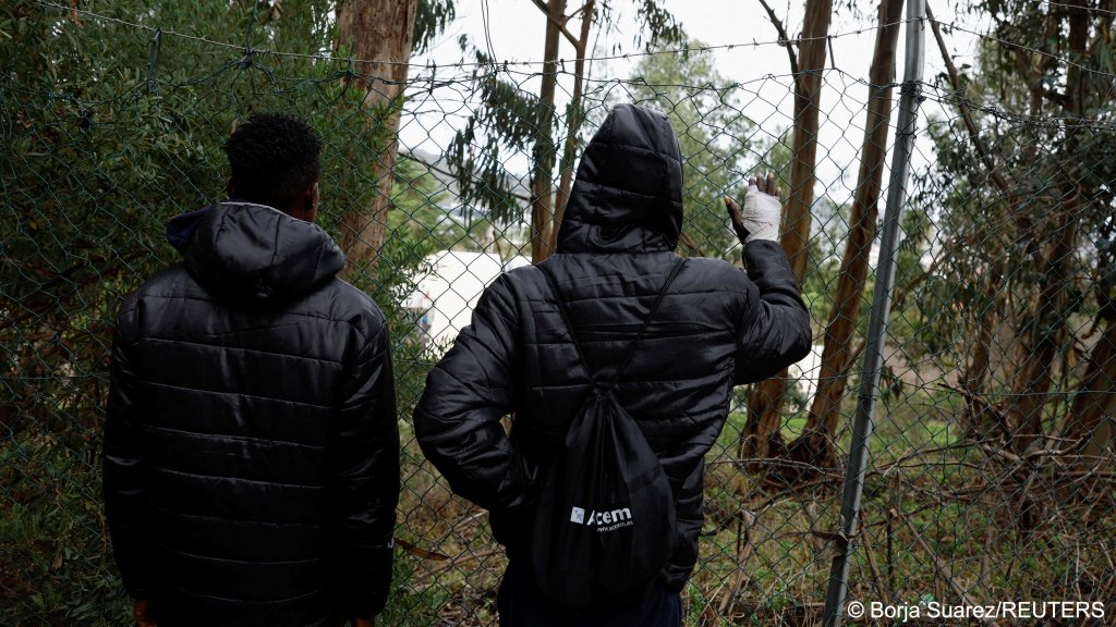 'We are children....they betrayed us' Moussa Camara and his friend told Reuters after being put into an adult camp | Photo: Borja Suarez / Reuters
