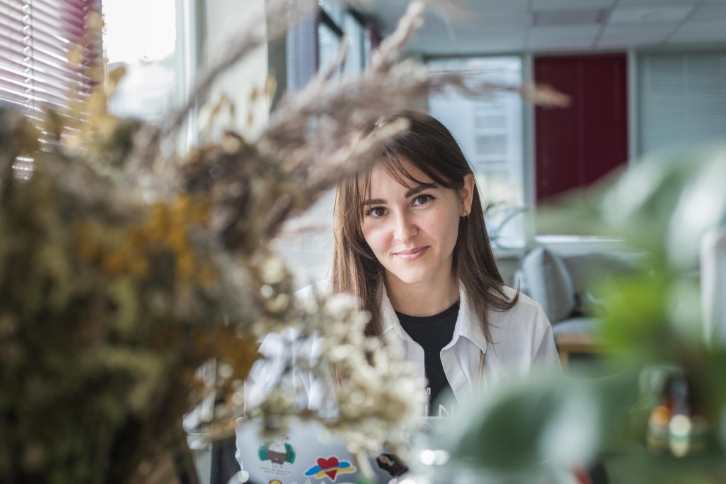 Irisha sitting at her desk on the 1st floor of the Tavi Draugi warehouse in Riga, Latvia | Photo: Martin Thaulow