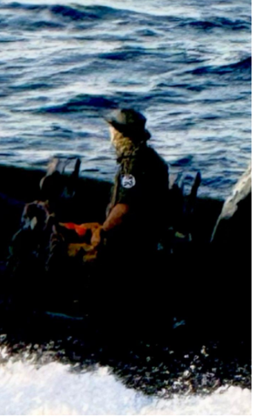 This photo shows a man wearing a uniform with a badge appearing to suggest he belongs to the 84th batallion, one of the special operations forces that act as an armed brigade for the authorities in Tripoli : Source: Mediterranea Saving Humans