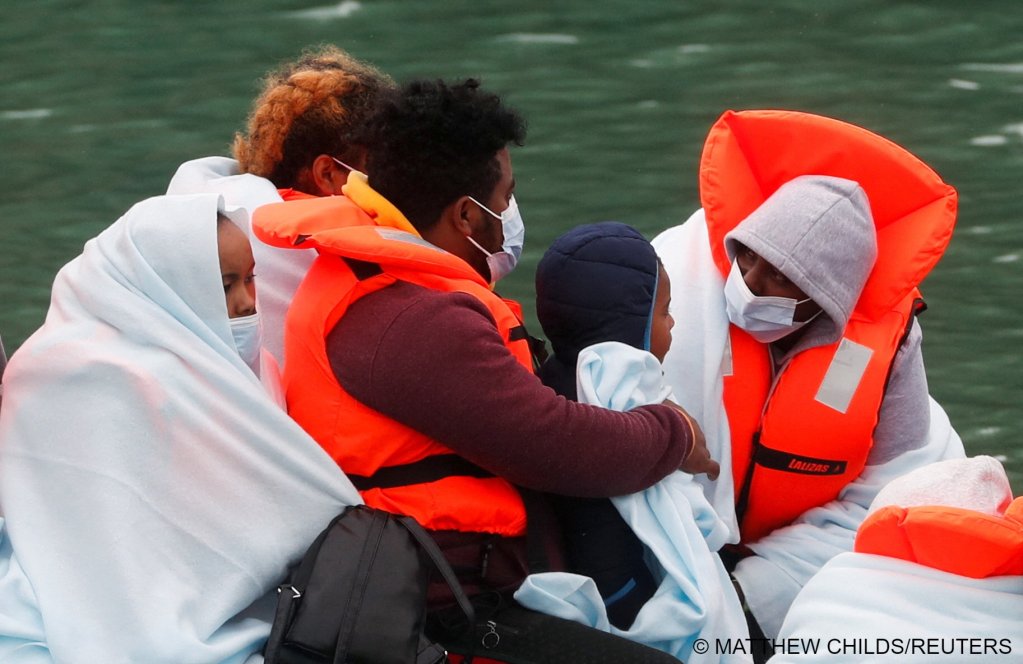 From file:  Border Patrol agents bring migrants into Dover harbor, after they tried to cross the channel in Dover, Britain| Photo: Matthew Childs / Reuters