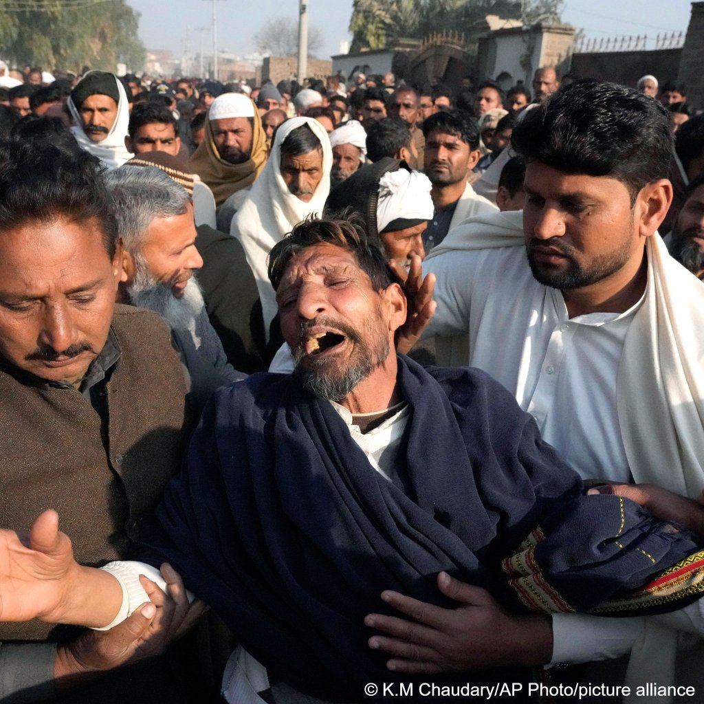 Ramzan Khan, father of one of the victims of a boat that capsized off the coast of West Africa in January, mouns his son Muhammad Arslan, in Mirza Virkan village, Pakistan on February 6, 2025 | Photo: K.M. Chaudary / AP photo / picture alliance