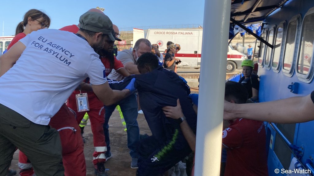 Some of the migrants needed help disembarking on Lampedusa after their ordeal at sea | Photo: Sea-Watch