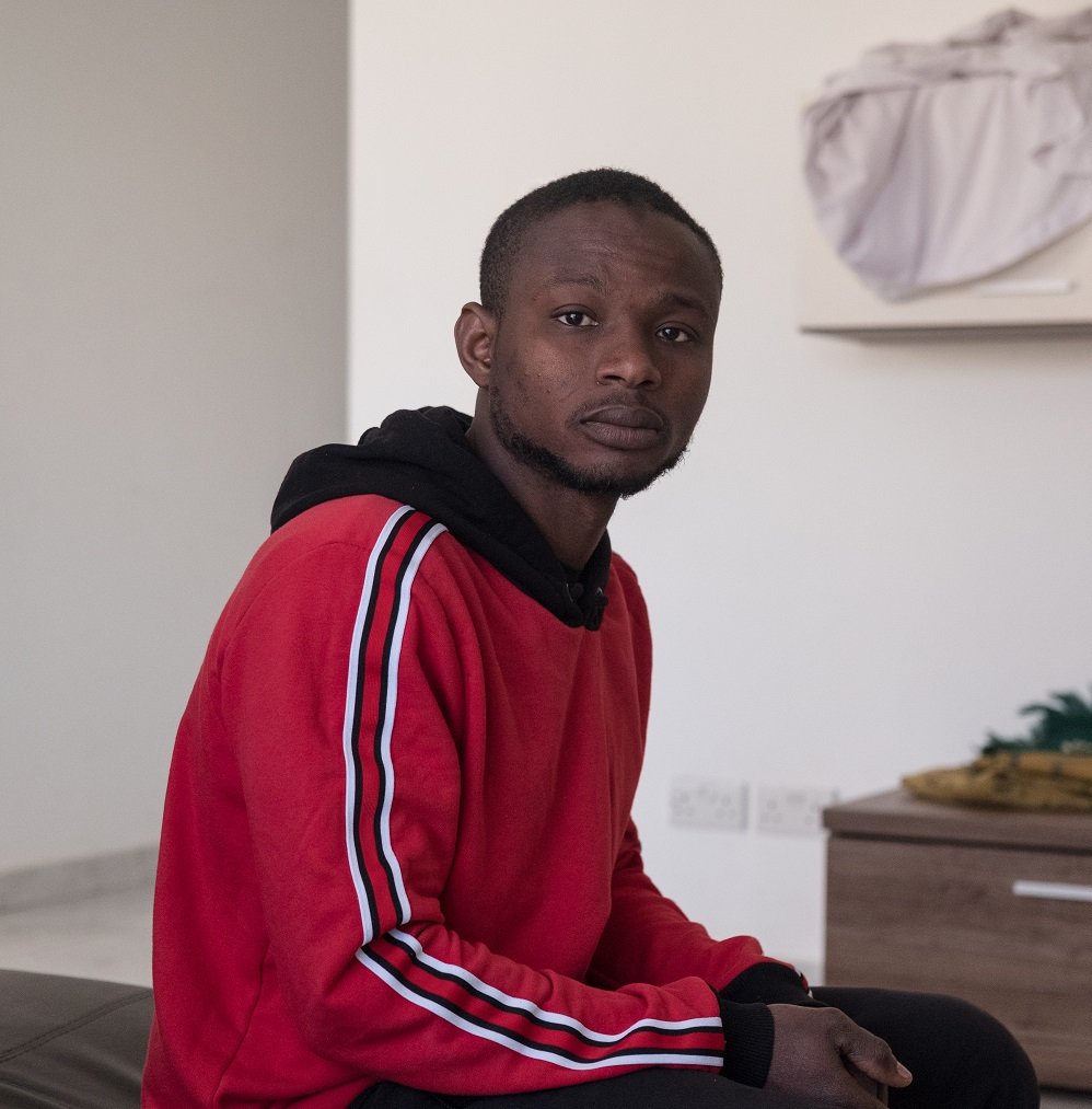 Amara hoped his language skills would lead him to a better life, instead it has meant he was put in trial | Photo: Joanna De Marco / Amnesty International