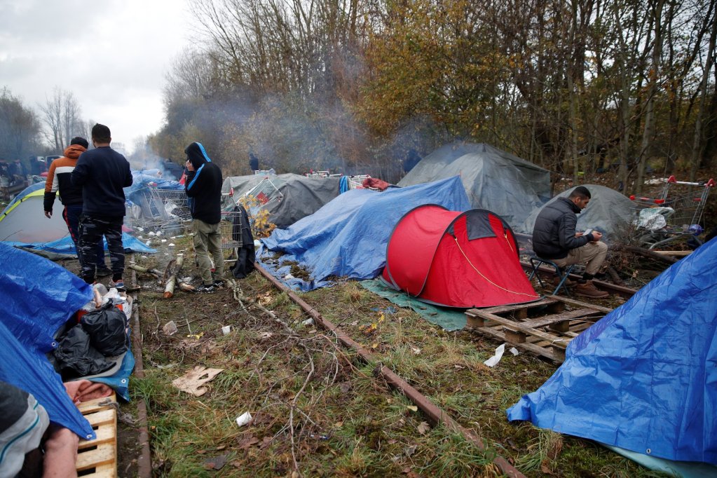 From file: Migrants sleeping rough on train tracks near Calais | Photo: Reuters