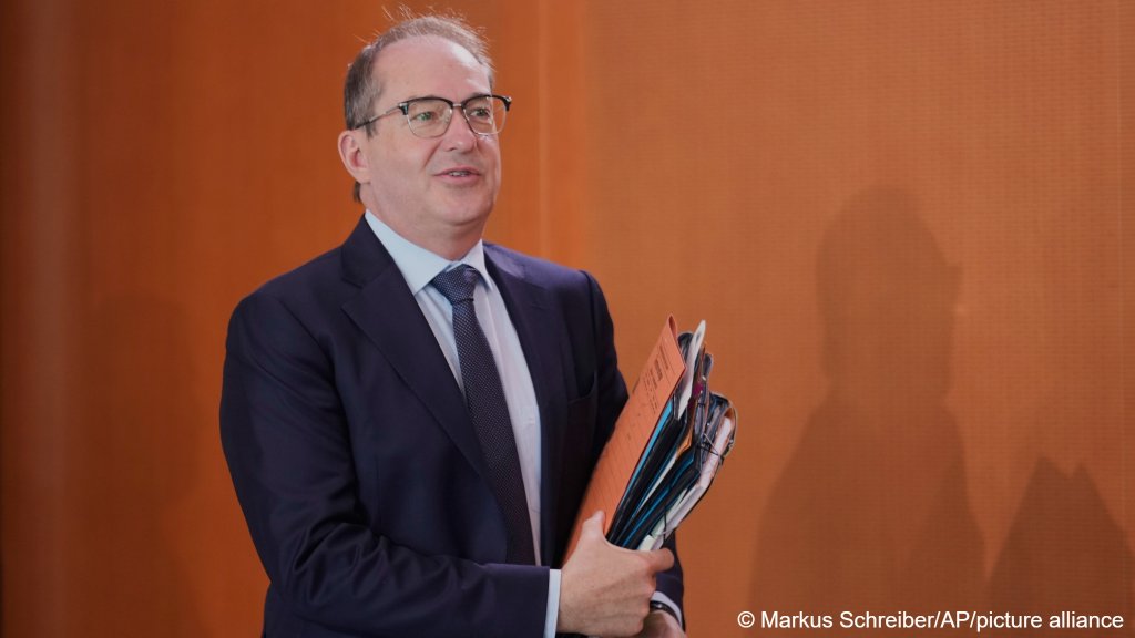 German Interior Minister Alexander Dobrindt arrives for the cabinet meeting at the chancellery in Berlin, Germany, Wednesday, July 2, 2025