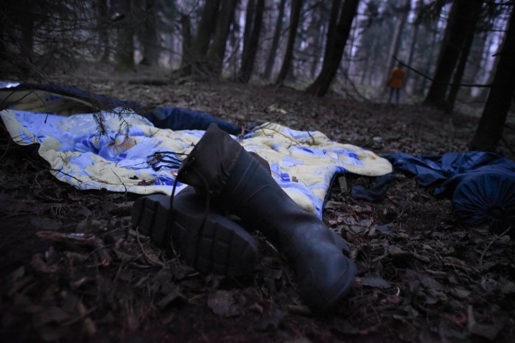 Boots and camping gears left by migrants in the forest near Poland's eastern border | Photo: Mehdi Chebil