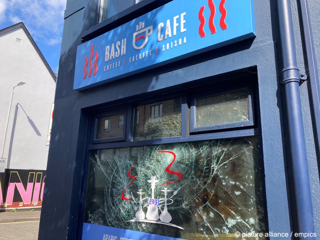 Scenes around the Bash Cafe on Donegall Road in south Belfast, which was burned on Saturday night following violent disorder which broke out after an anti-immigration protest in the city. Picture date: August 6, 2024 | Photo: Rebecca Black / empics / picture alliance
