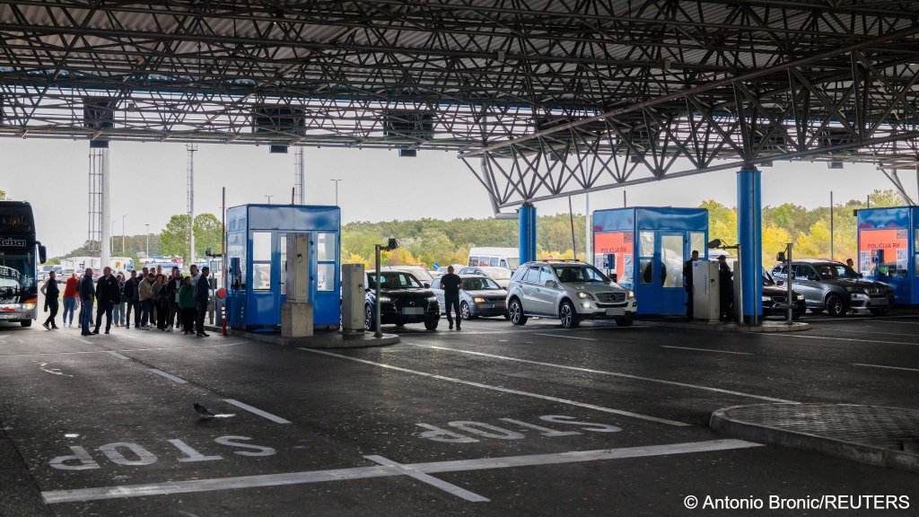 People undergo registration under the Entry/Exit System (EES), which requires all non- EU citizens to provide personal details, including fingerprints and facial images, upon their first entry into the Schengen area, at the Bajakovo border crossing in Croatia, October 12, 2025 | Photo: Antonio Bronic / Reuters