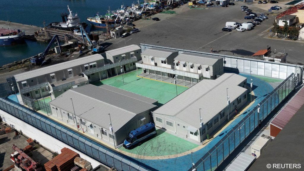 A drone view shows a reception camp set up as part of an Italian government plan to process migrants rescued at sea, in Shengjin, Albania, July 31, 2025 | Photo: Florion Goga / Reuters