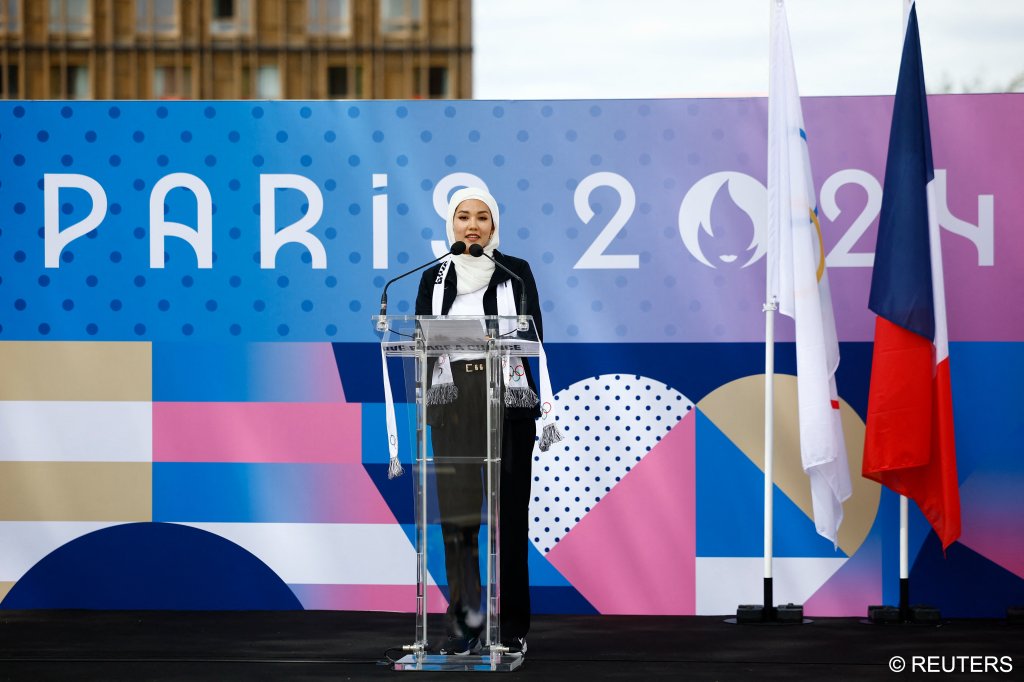 Chef de Mission for the Refugee Olympic Team Paris 2024, Masomah Ali Zada, speaks at the inauguration, July 22, 2024 | Photo: Reuters