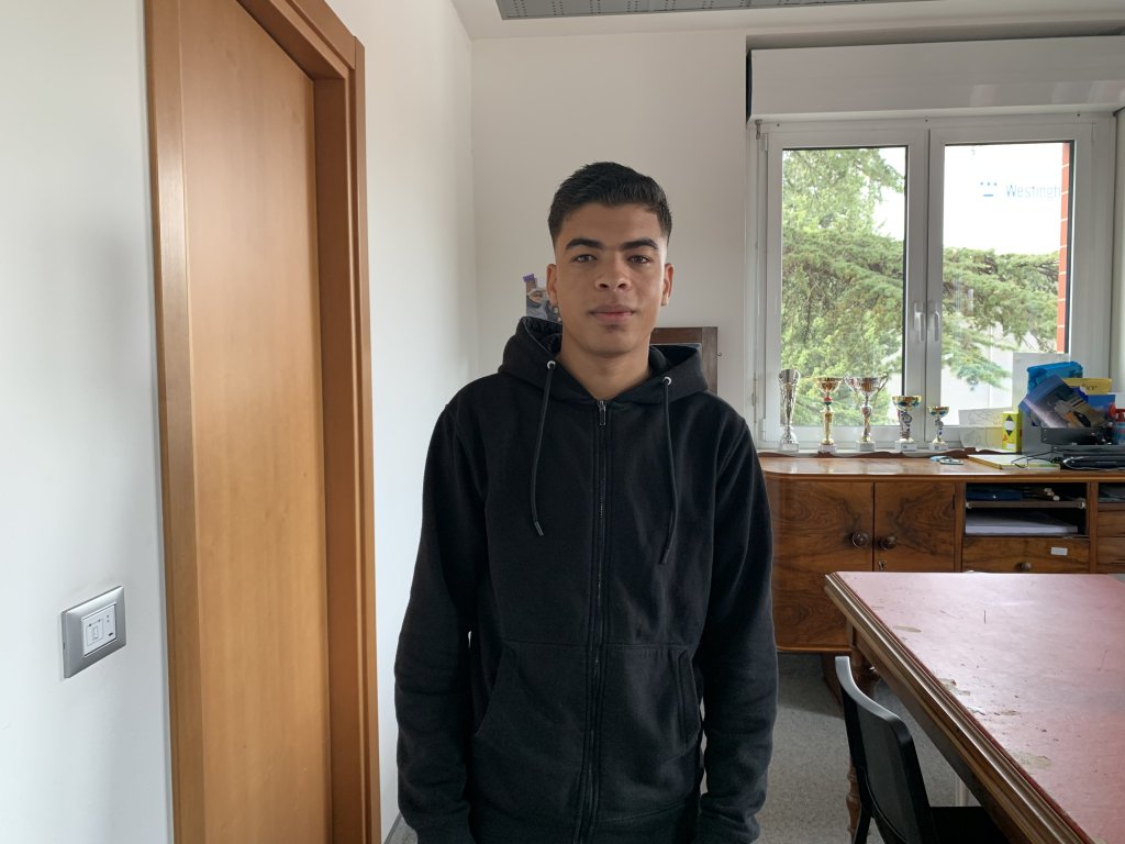 Youssef is 17 and from Egypt. He said it took him three months to travel the Balkan route to Italy, arriving just after his 17th birthday. When he leaves the community house for unaccompanied minors, he hopes to find work as a car mechanic | Photo: Emma Wallis / InfoMigrants
