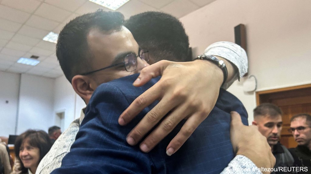 The defendants celebrated after the Kalamata court said it had no jurisdiction to hear the case as the shipwreck  happened in international waters, May 21, 2024 | Photo: REUTERS/Renee Maltezou