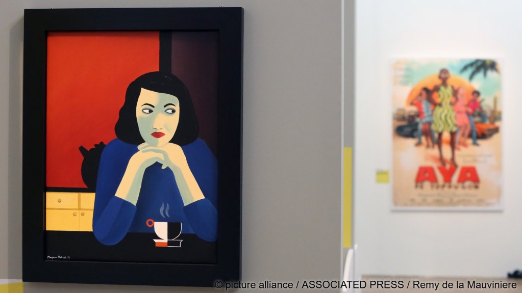 File photo: A painting by Iranian born French comics artist and film director Marjane Satrapi is presented as part of an exhibition on Comics and Immigration at the Museum of the History of Immigration in Paris, Monday in 2013 | Photo: Remy de la Mauviniere / picture alliance / Associated Press