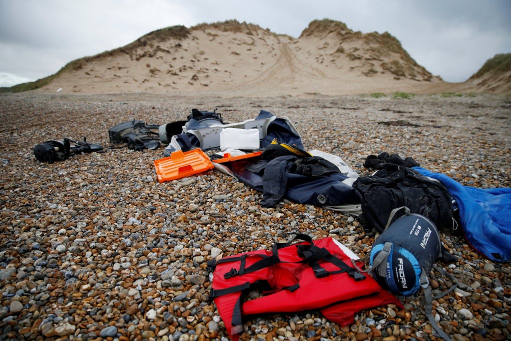Abandoned lifejackets and a damaged boat on the beach in northern France | Photo: Reuters