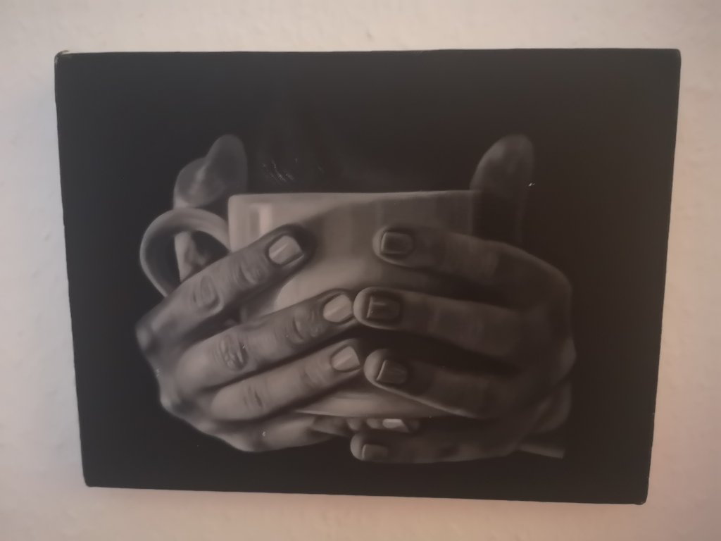 Hands holding a cup - painting by artist Kaya Jafari | Photo: Natasha Mellersh