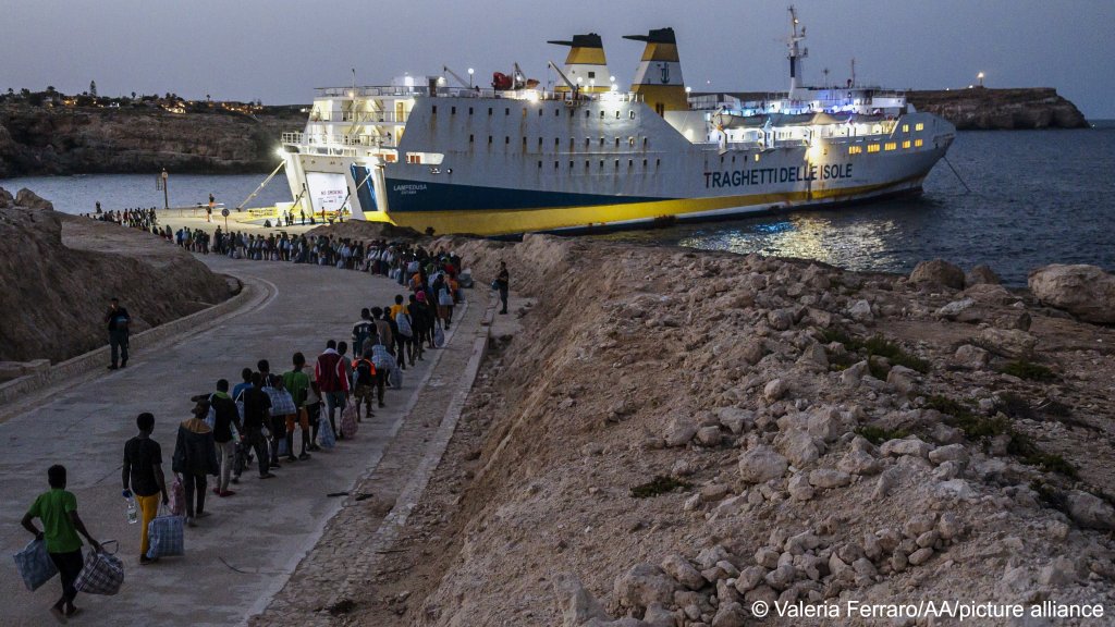 Migrants before embarking the Lampedusa Ferry as large scale transfer of migrants is taking place from the Sicilian island of Lampedusa to the Italian mainland, September 17, 2023. | Photo: Valeria Ferraro / Anadolu Agency