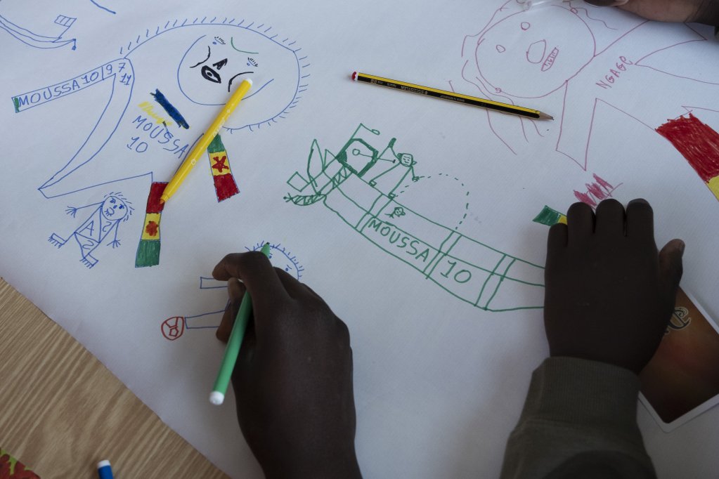 Drawings by unaccompanied migrant children on the Canary Islands | Photo: Pedro Armestre/Save the Children