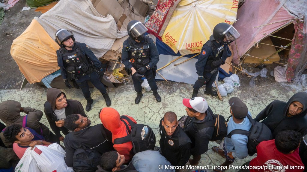 Police transfer people who arrived irregularly in Ceuta to a Temporary Reception Center for Foreign Nationals (CATE) for registration | Photo by Marcos Moreno /Europa Press/ABACAPRESS.CO