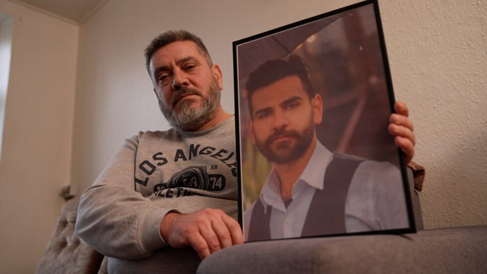 Husam Bibars with a photograph of his son Majd, who he believes died on the Balkan route in September 2023 | Photo: ARD studio Wien via Lighthouse Reports