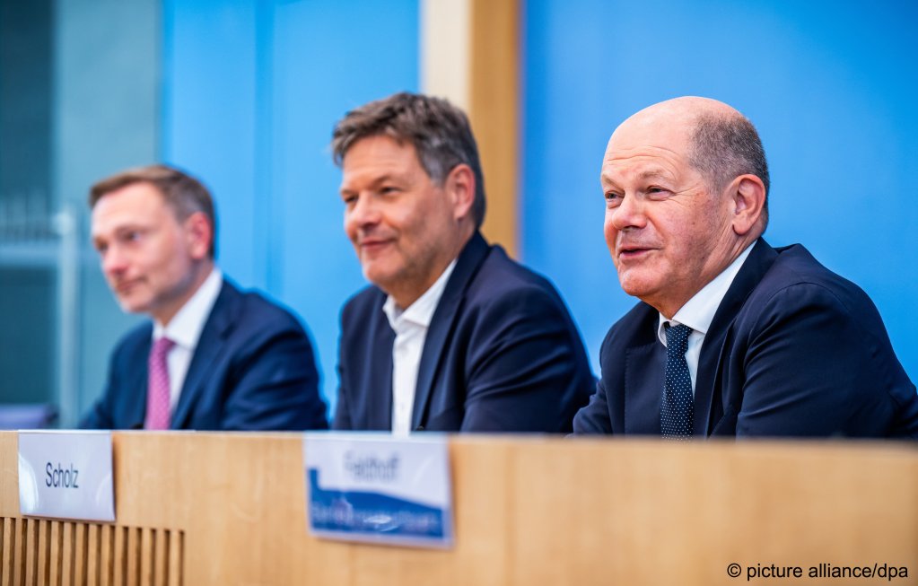 German Chancellor Olaf Scholz (SPD, r-l), Robert Habeck (Green), Economy and Climate Minister, and Christian Lindner (FDP), Finance Minister present the German budget for 2025 on July 5| Photo: Michael Kappeler /picture alliance/dpa
