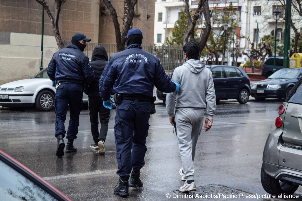 From file: In the battle against illegal immigration, Greek Police officers are seen here detaining irregular migrants without legal residence permit in central Athens on March 20, 2022 | Photo: Dimitris Aspiotis/Pacific Press