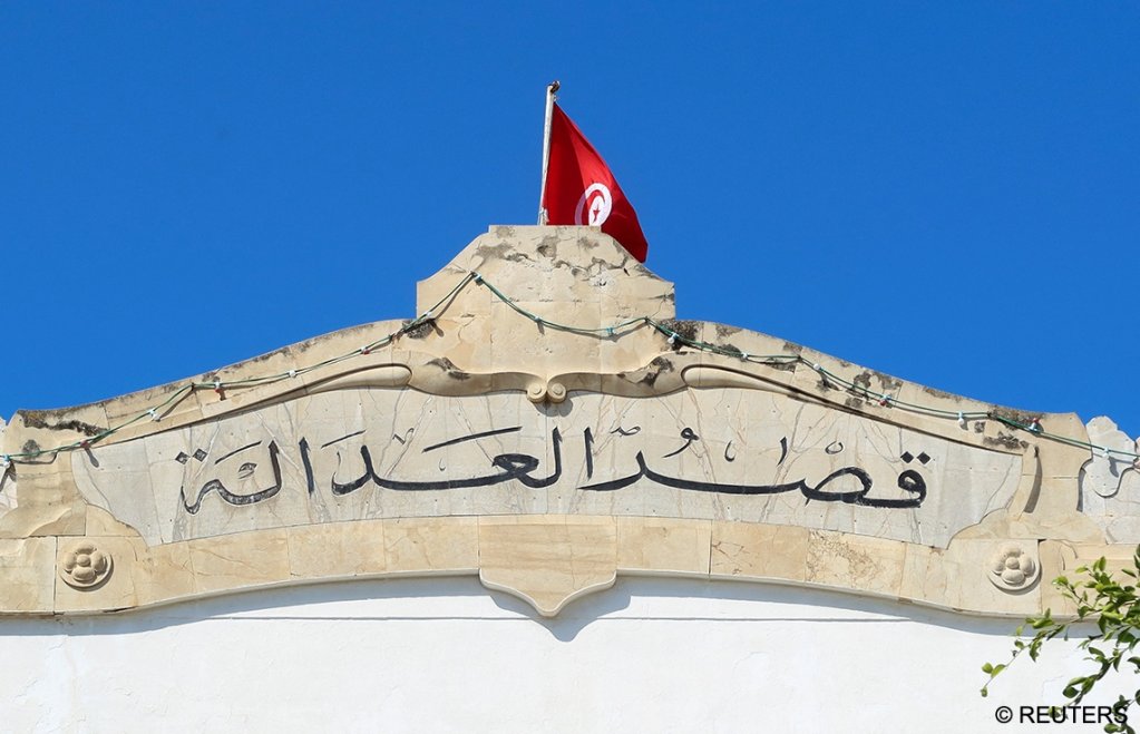 A Tunisian flag flutters atop of the Palace of Justice building in Tunis, Tunisia May 13, 2024 < Photo. Jihed Abidellaoui / Reuters