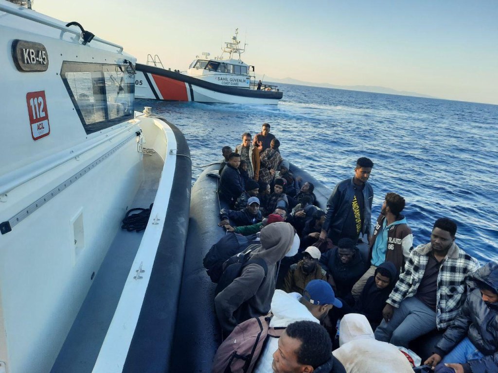Picture provided by the Turkish coast guard appears to show several chidlren and young people on board this migrant boat found drifting off Izmir after the engine failed | Source: Turkish coast guard press office