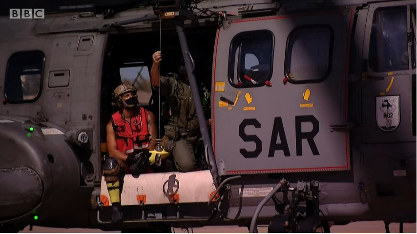 A screenshot of the Search and Rescue helicopter from the Spanish military used in the mission | Source: BBC Video