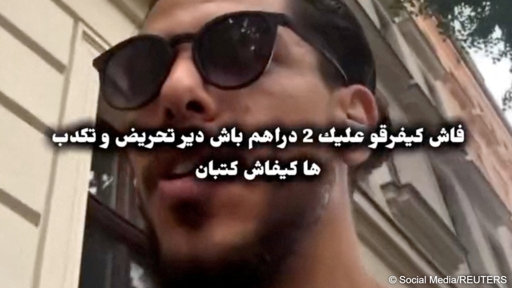 A Moroccan man speaks in a selfie video encouraging people to make a journey to Ceuta in Spain, in Leipzig, Germany, in this screengrab taken from an undated social media video. Location verified by buildings and signs which matched satellite and archive imagery | Social Media / Reuters