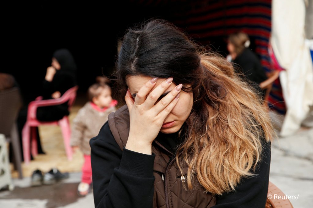 From file: A relative of Maryam Nuri, who died trying to cross the English channel, at a memorial in Erbil, Iraq, on November 28, 2021 | Photo: Reuters
