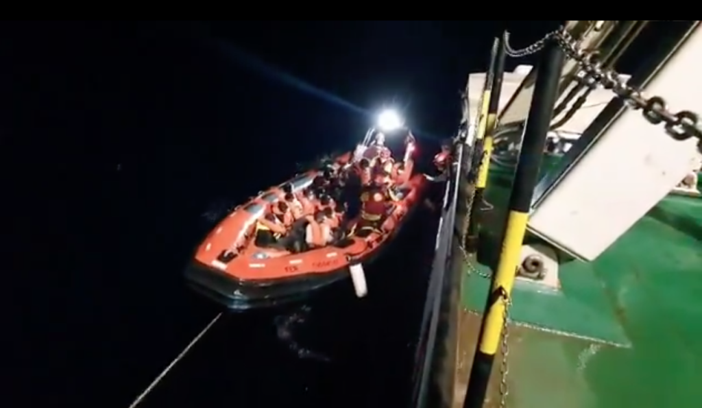 A picture from the rescue of people, including Abou on the night of September 10 by Open Arms | Photo: Screenshot Open Arms