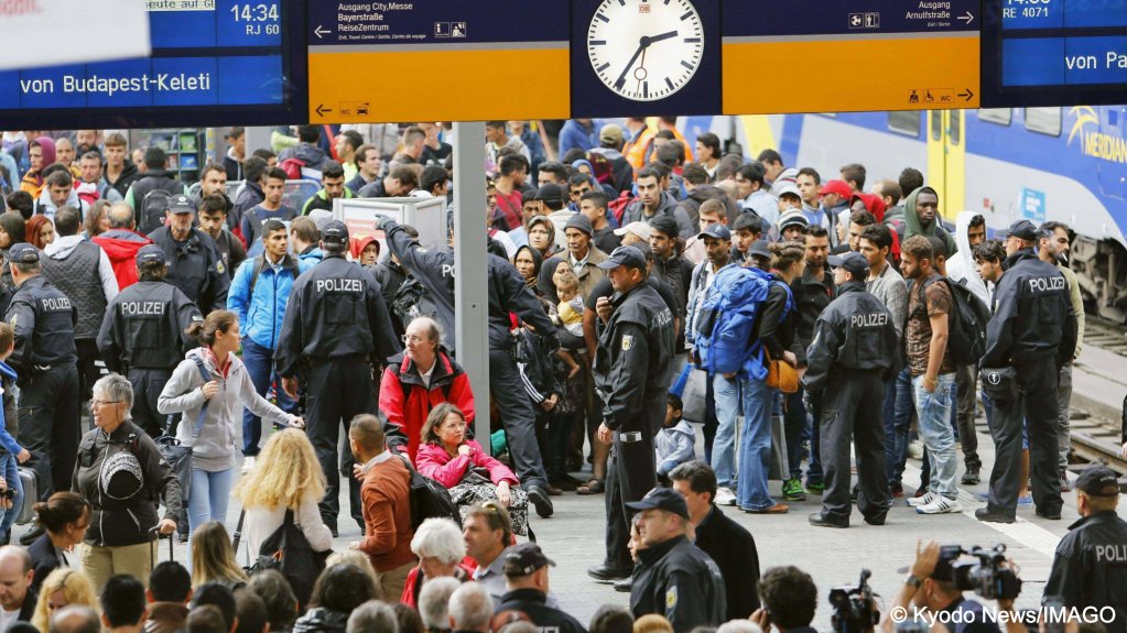 File photo: According to German police, more than 10, 000 refugees and migrants
arrived at the station in southern Germany on Sept. 5 and 6 from Austria aboard special trains arranged
to manage the refugee crisis | Photo: Imago