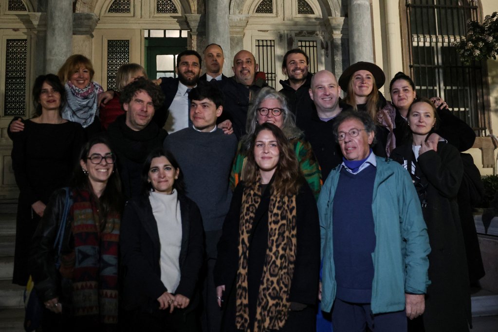 NGO workers who wre acquitted after trial in Greece in mid-January, including Sarah Mardini and Sean Binder | Photo: Reuters