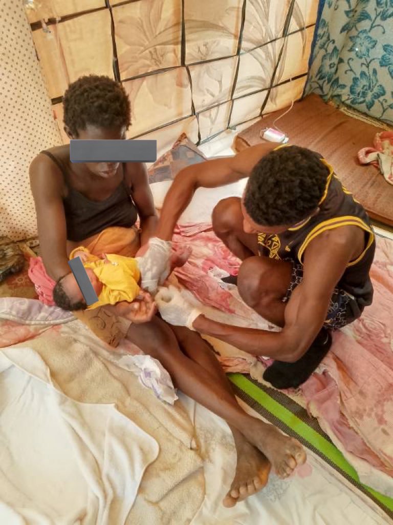 File photo: Ibrahim takes care of a mother and her baby in a tent that he has tried to equip like a hospital in one of the camps around Sfax | Photo: Private