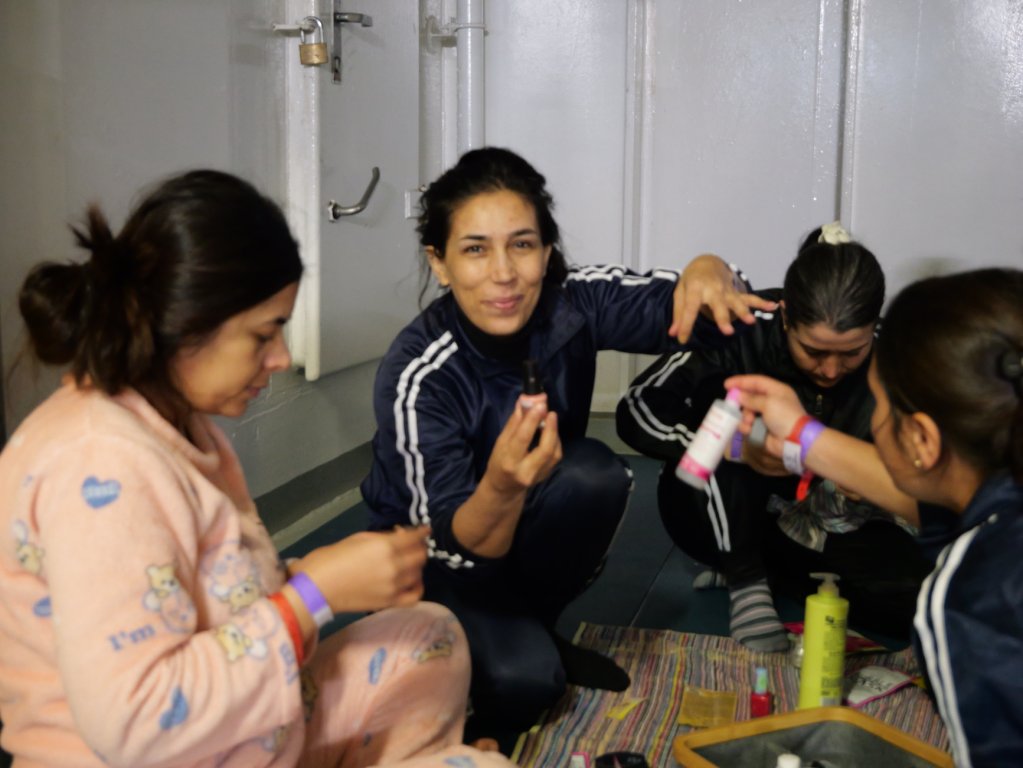 Dilba participates in a beauty and wellness session run by Doctors Without Borders on board the Geo Barents in the Central Mediterranean Sea following her rescue in February, 2024 | Photo: Sou-Jie van Brunnersum