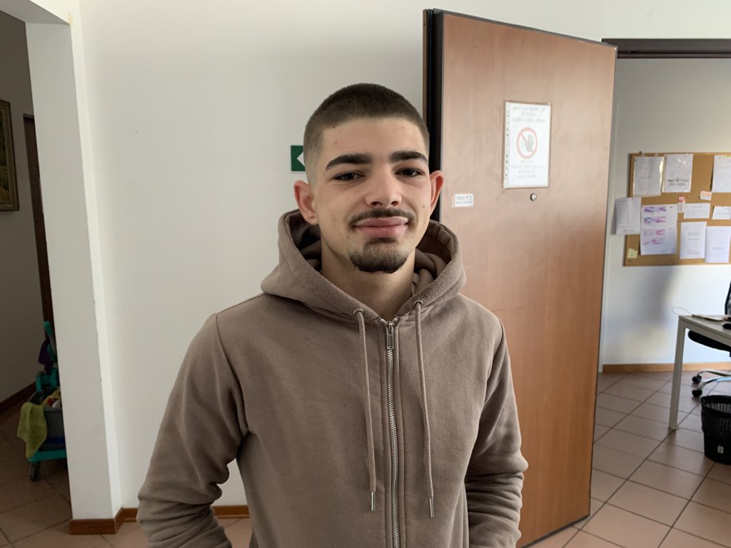 Alessio from Albania arrived in Italy when he was just 14 and has spent four years living in various community accommodation buildings in Trieste and Monfalcone. He has now started work as a pizzaiolo (pizza maker) | Photo: Emma Wallis / InfoMigrants