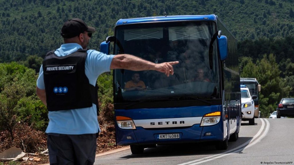 The camp is watched over by private security guards | Photo: Angelos Tzortzinis/AFP