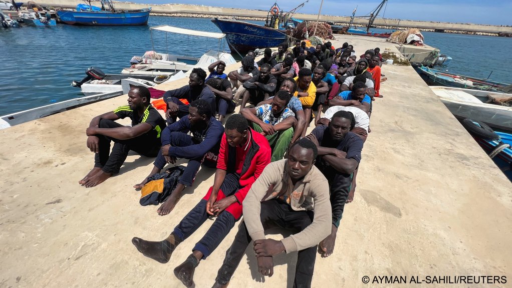 Rescued migrants arrive on a rubber dinghy in Libya on June 8, 2023 | Ayman al-Sahili/Reuters
