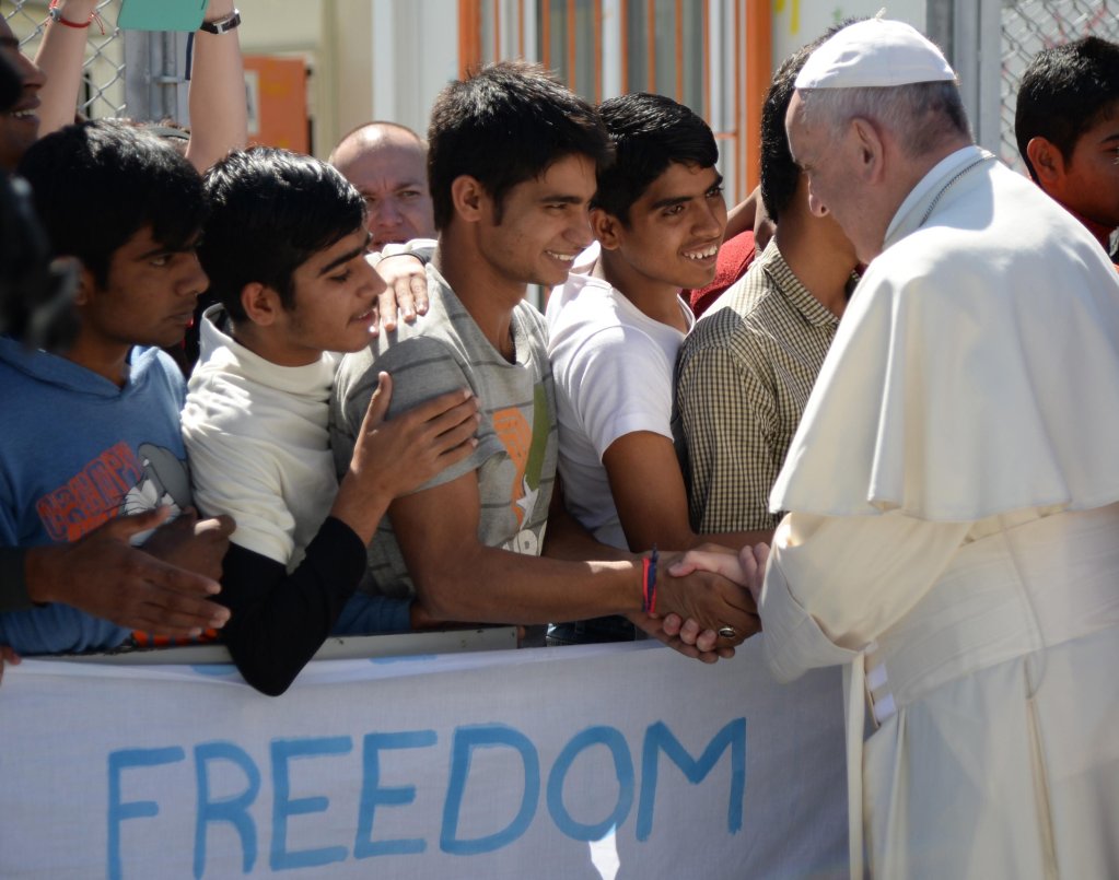 Pope Francis greeting migrants and refugees at the Moria refugee camp on the Greek island of Lesbos. PHOTO/ARCHIVE/ANSA/AFP/FILIPPO MONTEFORTE/POOL