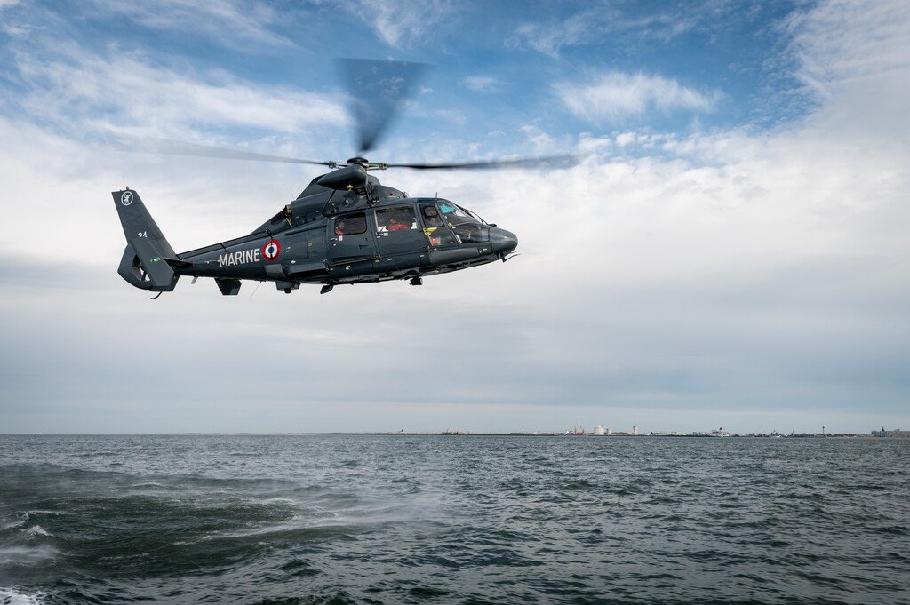 A French navy helicopter helps during a rescue of migrants in the Channel, during which one woman died | Source: X @premarmanche
