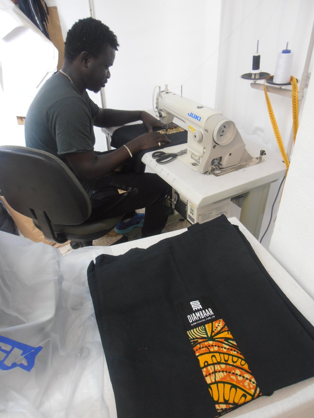 Kewa Sarr, a tailor from Gambia, joined DiomCoop cooperative this year | Photo: Judit Alonso