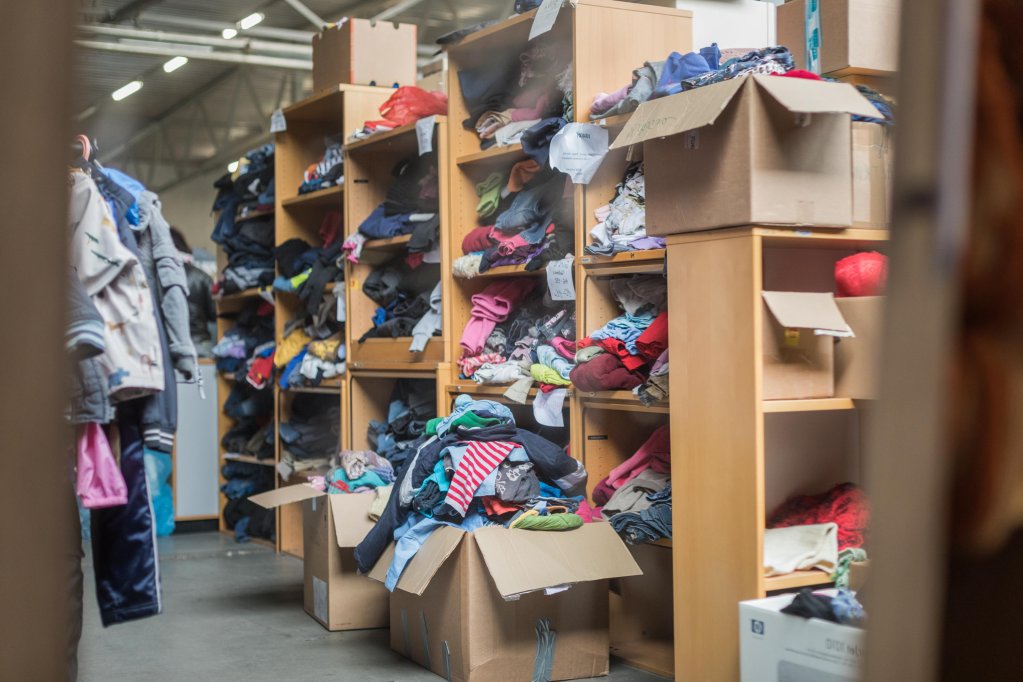 Donated clothes seen inside a warehouse of Latvian NGO Tavi Draugi in Riga | Photo: Martin Thaulow