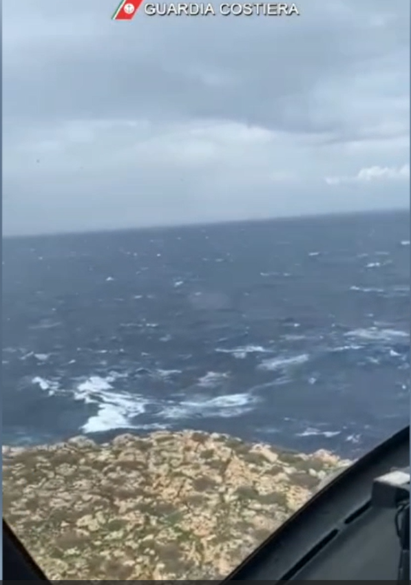 Seas look rough from the helicopter hovering above the island of Lampione | Photo: Screenshot from video provided by Italian Coast Guard (Guardia Costiera)