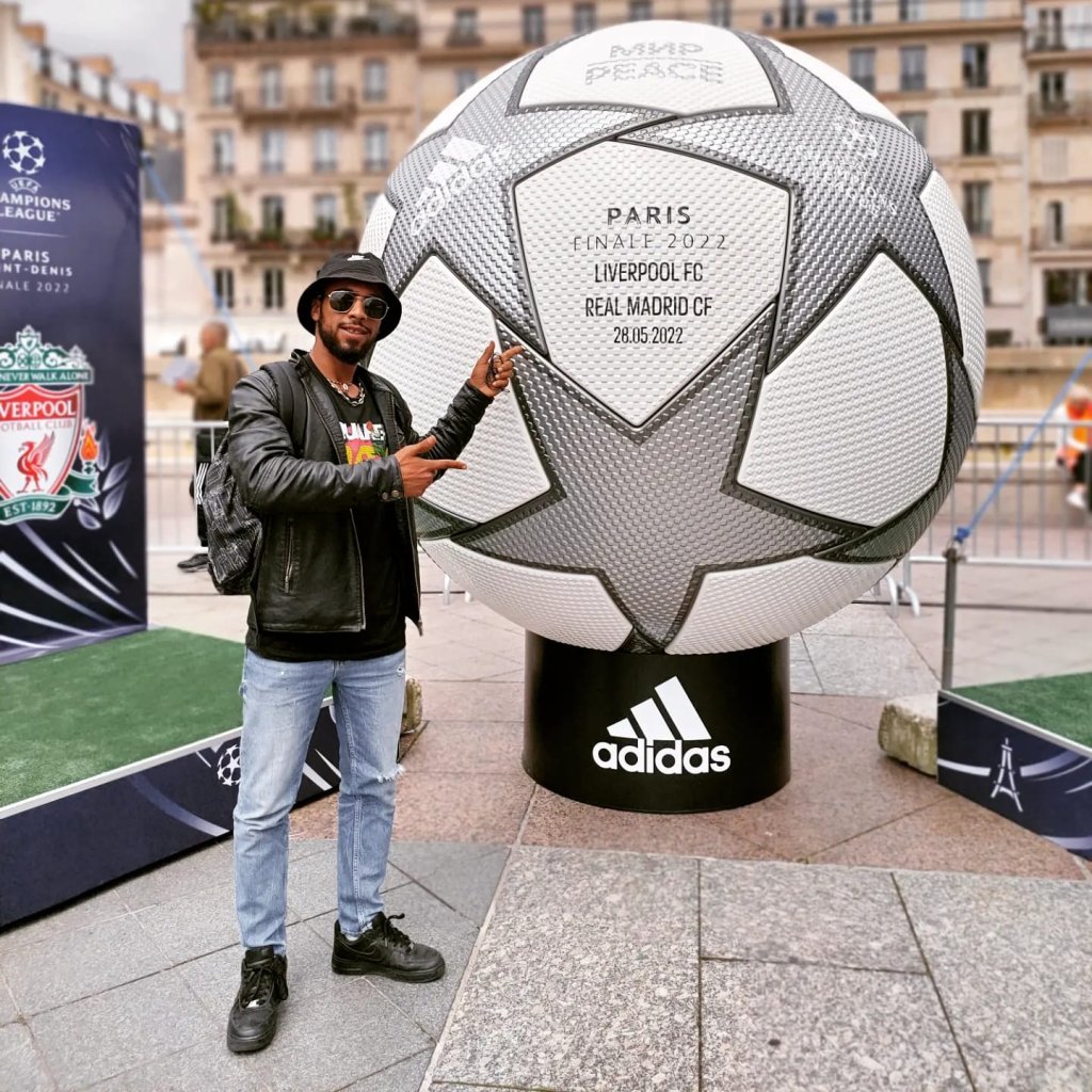 Ayoub poses near a giant football to commemorate the UEFA Champion's League Final in Paris | Photo: Private