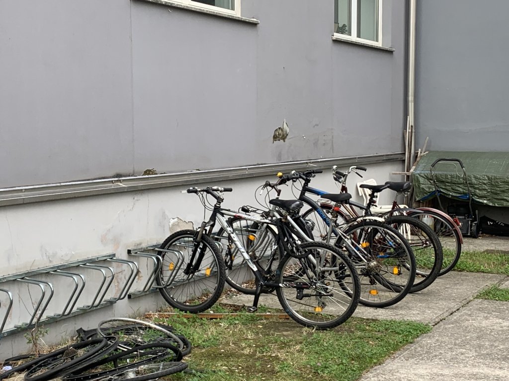 Bikes in the garden outside the community house for unaccompanied minors in Monfalcone | Photo: Emma Wallis / InfoMigrants