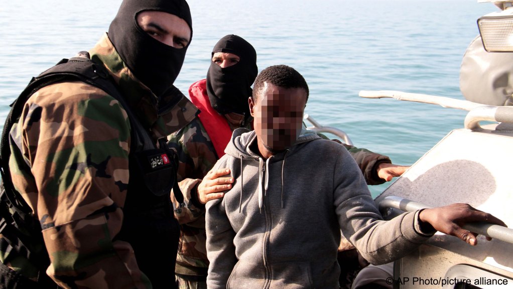 A migrant from sub-Saharan Africa stopped by Tunisian Maritime National Guard at sea during an attempt to get to Italy, near the coast of Sfax, Tunisia, Tuesday, April 18, 2023 | Photo: picture alliance/AP Photo