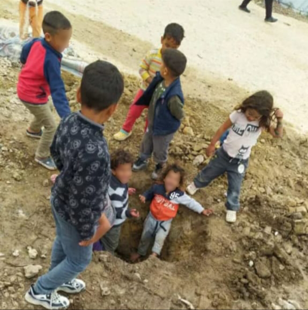 A photo from the Human Rights Watch report shows children playing in the soil at the Mavrovouni camp | Source: HRW / Private
